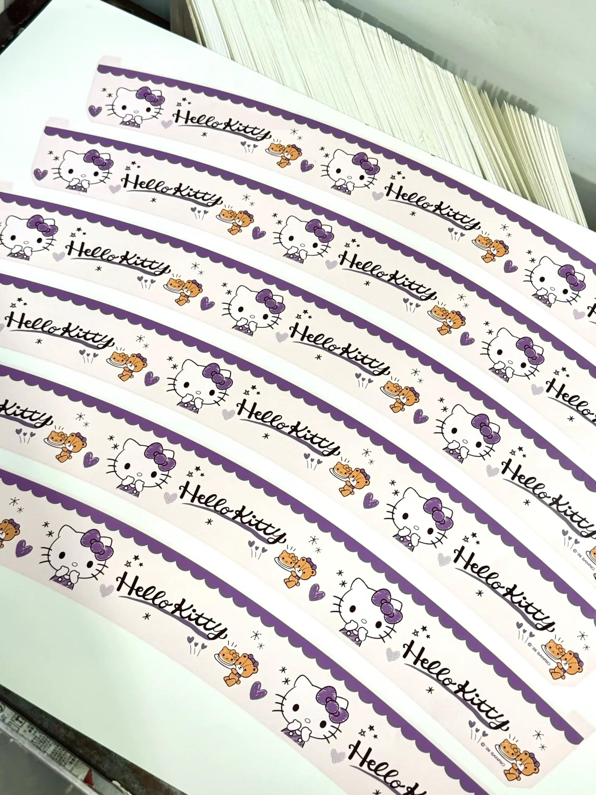Printed waterslide decal strips with purple character border artwork